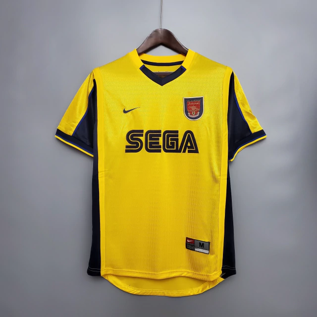 img_5516-5605cf2f646108fbf917332634521695-640-0 Camisa Retrô Arsenal Away 1999/2000 Nike Amarela - Imagem 1