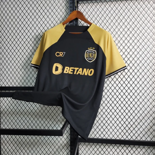 Camisa Sporting Third Versão Torcedor CR7 2023/24 Dourada - Imagem 2