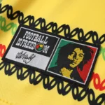 Camisa Jamaica Home Copa do Mundo 2026 Bob Marley Torcedor Amarela Adidas - Imagem 5