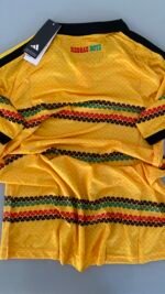 Camisa Jamaica Home Copa do Mundo 2026 Bob Marley Jogador Amarela Adidas - Imagem 16